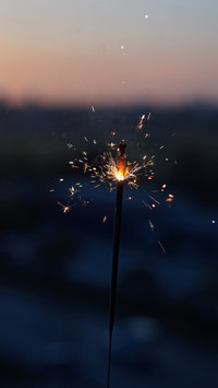 a sparkler firework with blur sky morning