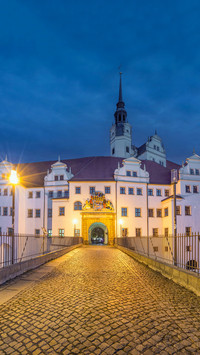 Hartenfels Castle at dusk in Torgau, Germany