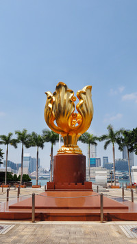 Take a photo at the city landmark of victoria harbour