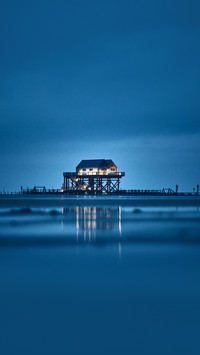 Stilt house at sankt peter-ording germany at night