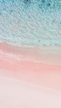 In the sea corner lies a secret realm of pink sand