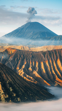 The volcano erupts at sunrise