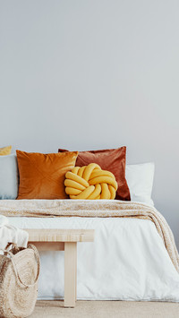Bright bedroom with natural decorations