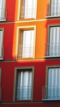 Orange exterior wall, sunset, quiet window