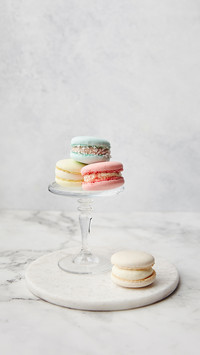 French cake macarons on a marble background