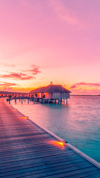 Amazing sunset panorama Maldives luxury resort villas