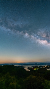 The starry night over qiandao lake is serene