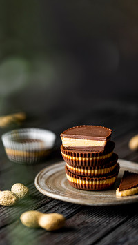 Healthy peanut butter cups tower moody food photography