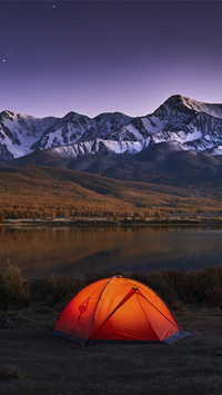 Tent near by Lake and Moutains