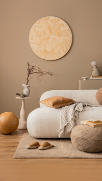 Warm and cozy living room interior with round wall panel