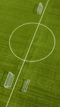 Close up of the midfield circle in an empty football field