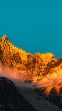 Meili Snow Mountain bathed in sunlight