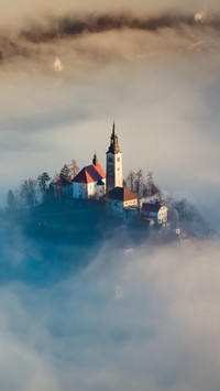 Church in Mountain's Embrace, Morning Mist Adds Mystique