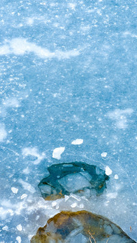 High view of icy lake and snow plains