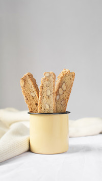 Almond biscotti or cantucci in an enamel cup