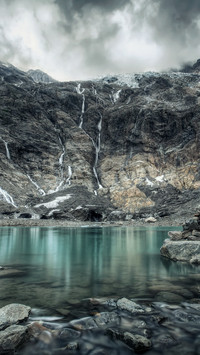 Crimson lake glows with cold shadows