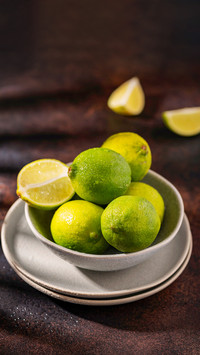 Fresh green limes with a strong summer light
