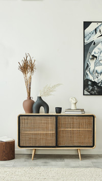 Living Room of Modern Apartment with Wooden Commode