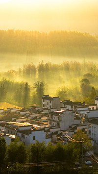Autumn morning misty village scene in southern Anhui