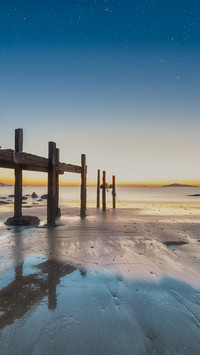 Sunrise over the pier in the village of the conference