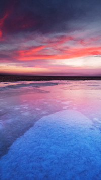 Ice lake reflects sunset glow