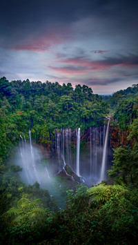 Waterfall in The Forest Flows to The Canyon