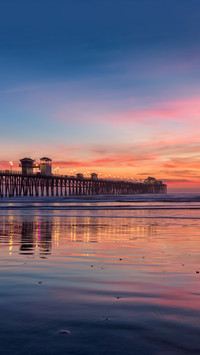 California Oceanside pier over the ocean at sunset