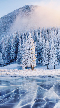 Snow Mountain by Frozen Ice Lake