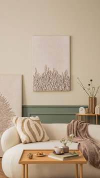 Cozy living room interior with mock up poster frame
