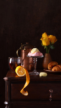 Still life with coffee and desserts