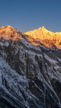 Meili Snow Mountain bathed in sunlight