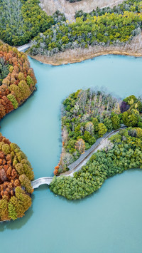 The landscape of mountains, rivers, and farmland is beautifu