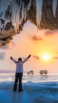 Woman Standing on The Ice And Waving His Hands