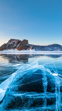 Baikal Lake’s transparent, cracked blue ice in winter