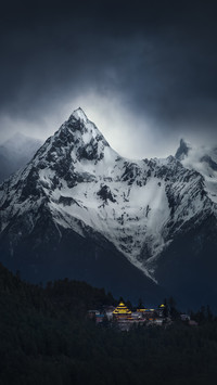 The sacred mountain temple amidst the clouds and mist