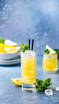 Fresh summer cocktail with lemons