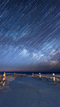 Milky Way Star Trails abstract over a beach path