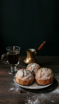 Delicious muffins sprinkled with powdered sugar