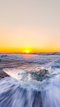 Golden ice on daimond beach, South Iceland