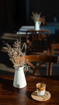 a glass with dirty coffee
