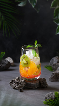 Cocktail with Tropical Fruits in a Glass