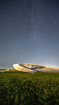 Ufo shaped buildings under the starry sky