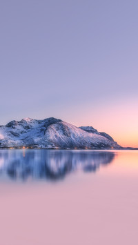 Beautiful snow covered mountains and colorful sky