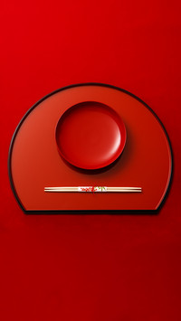 Japanese lacquer ware against red background closeup2