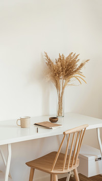Room with wooden chair, table,  mug, and notebook
