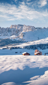 Snowy hills of Alpe di Siusi village