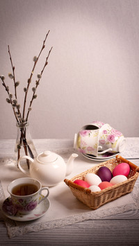 Easter composition with painted eggs and willow branches