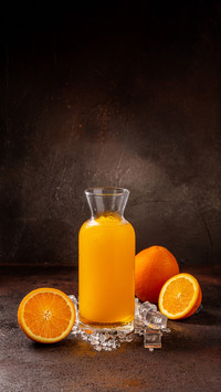 Healthy colorfull fruit shakes with ice on textured table