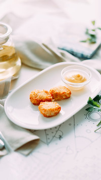 Chicken and cheese nuggets with sauce