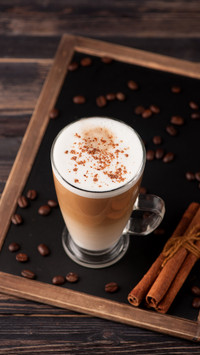 Cup cappuccino with cinnamon
